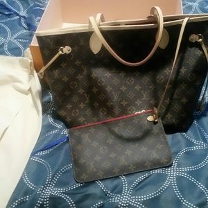 Never full monogram canvas with pouch.