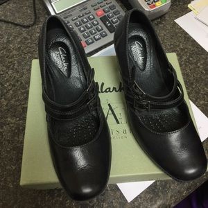 Black leather Clark strapped heel