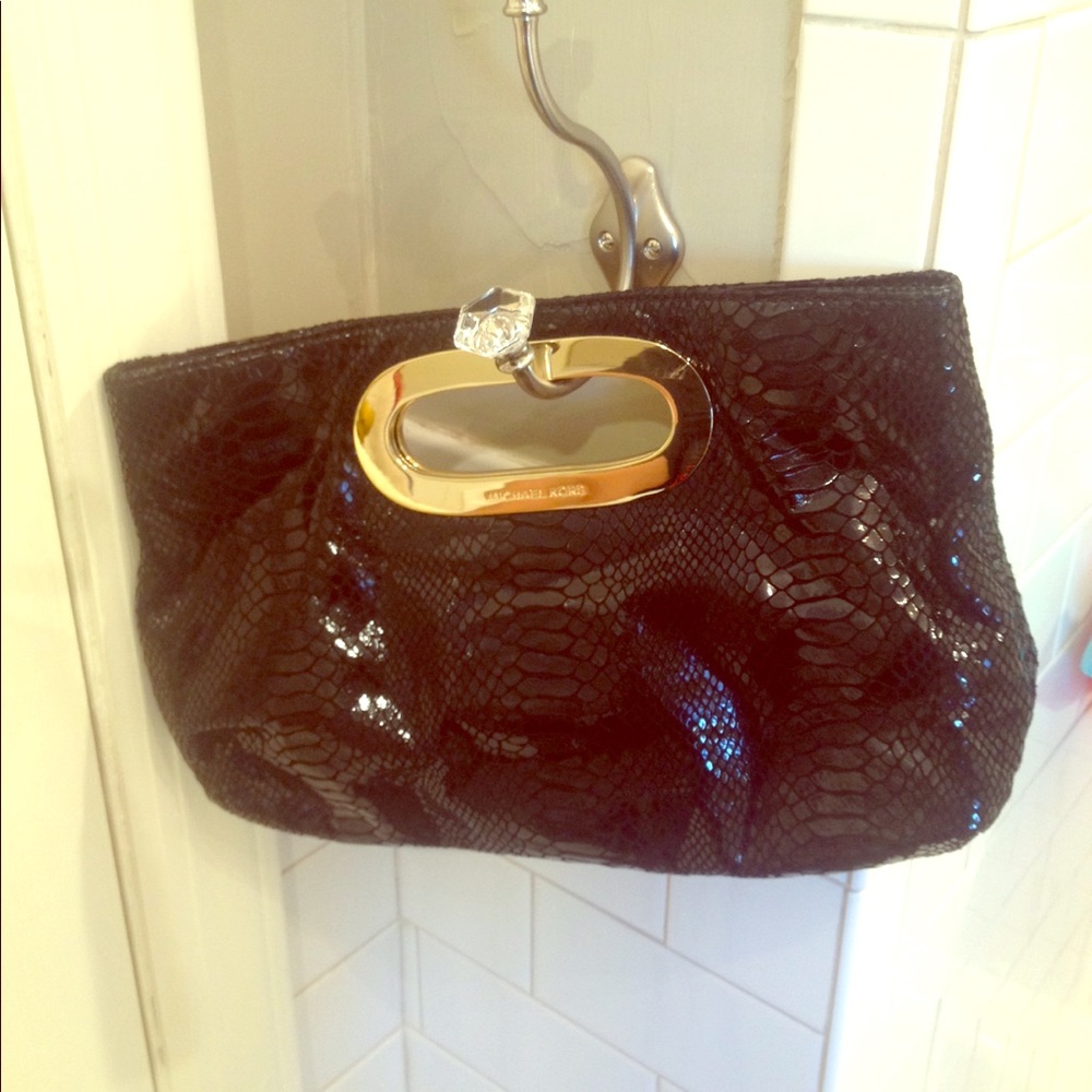 Michael Kors Black clutch with gold handle