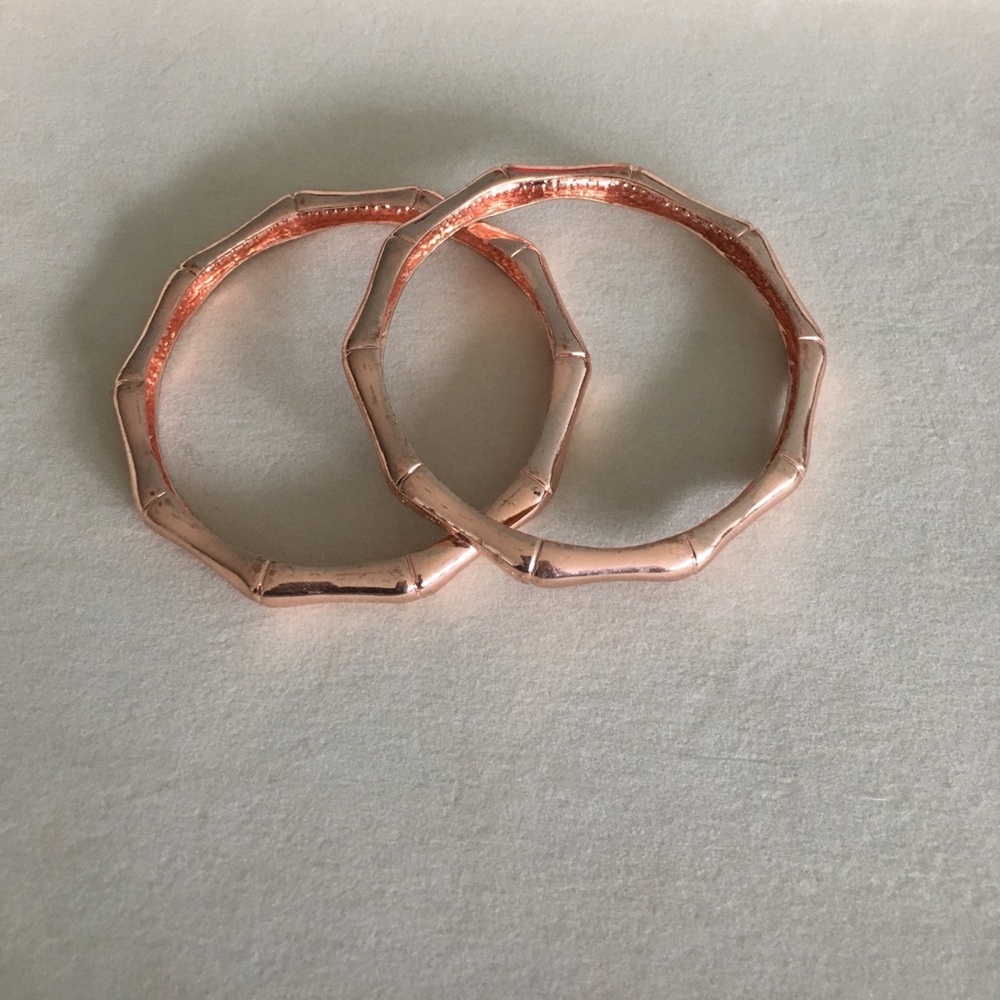 Two rose gold bamboo bangles