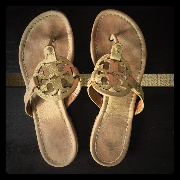 Tory Burch Shoes - Used Tory Burch gold flip flops, size 7