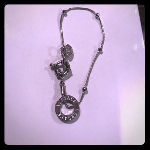 Versace bracelet with his signature medusa head