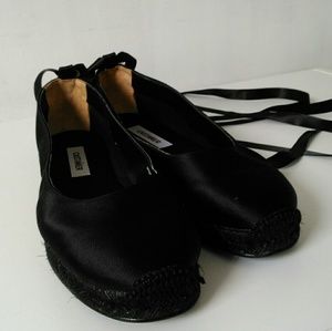 Black satin ballet slippers with ribbons