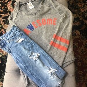 Adorable sweatshirt and distressed jeans