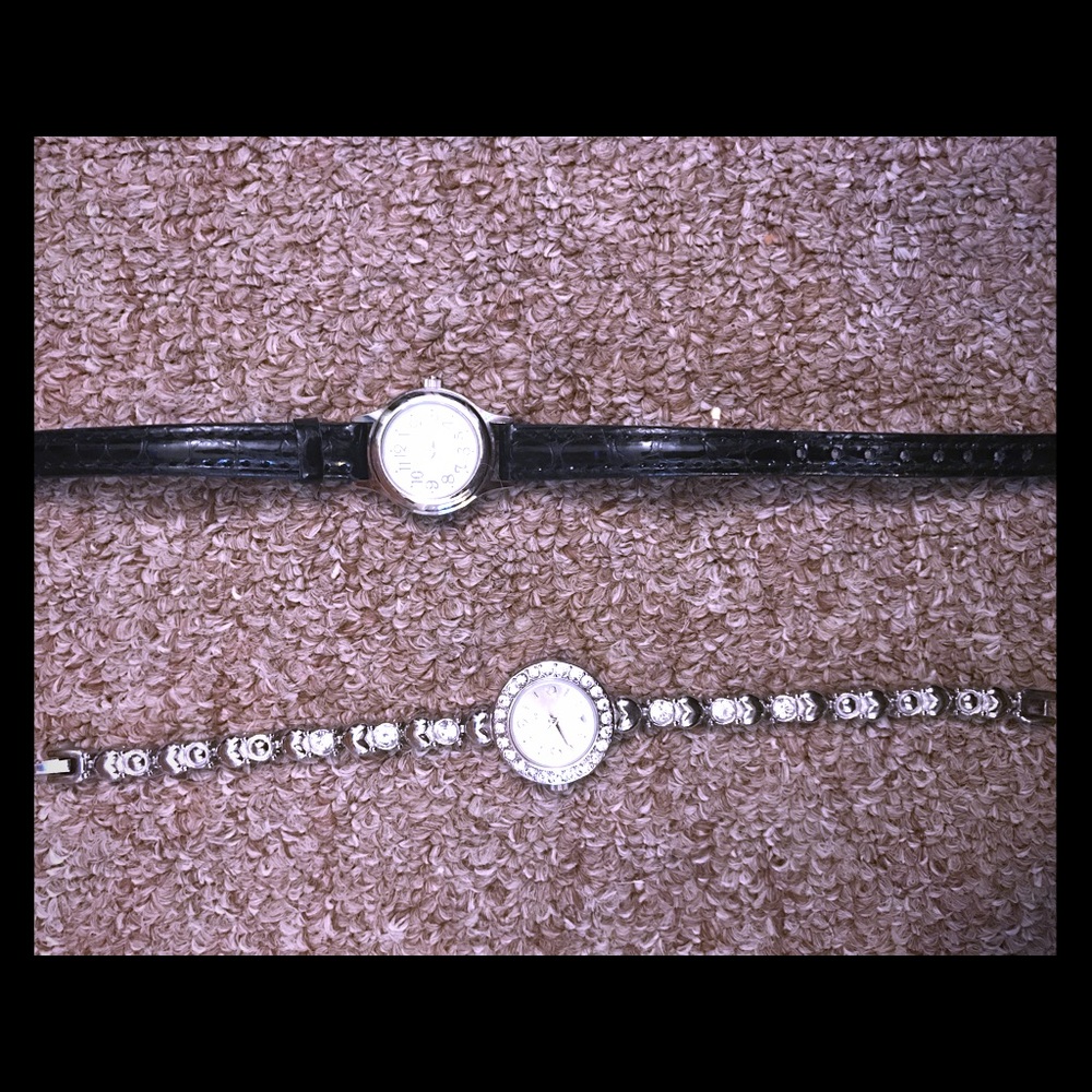 A thin black watch & a very pretty bracelet watch