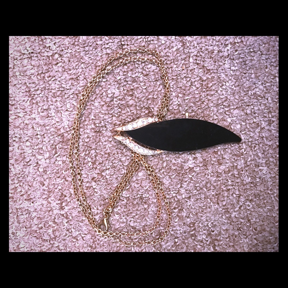 Long black and silver studded necklace