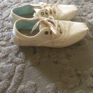 Brand new metallic cream toms shoes