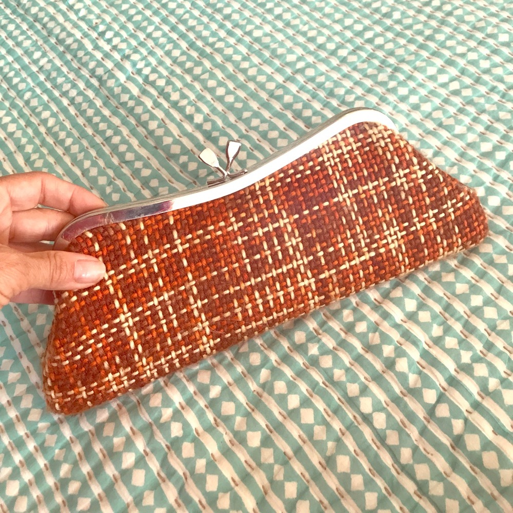 A Chic Woven Wool Plaid Clutch with a Strap