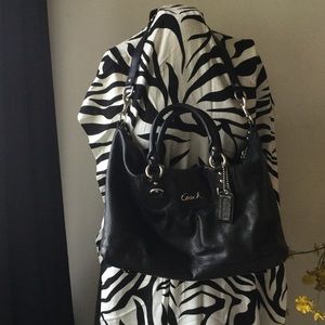 Coach black medium bag with purple lining