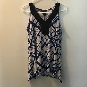 Sleeveless V Neck Blouse.