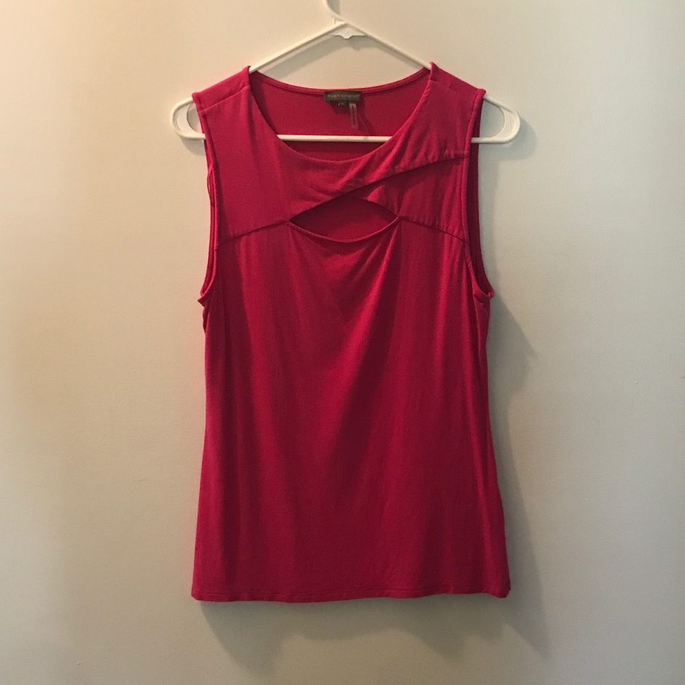 Cut out. Sleeveless. Fun Top.