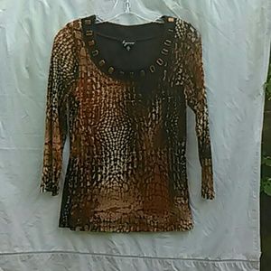 From LYNN RICHIE , this Blouse features