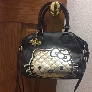 Hello kitty big purse with free hello kitty cups!