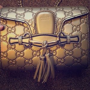 Gold Gucci purse-authentic