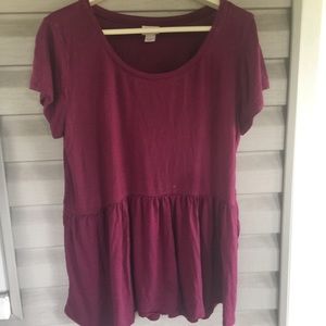 Maroon colored peplum short sleeve top