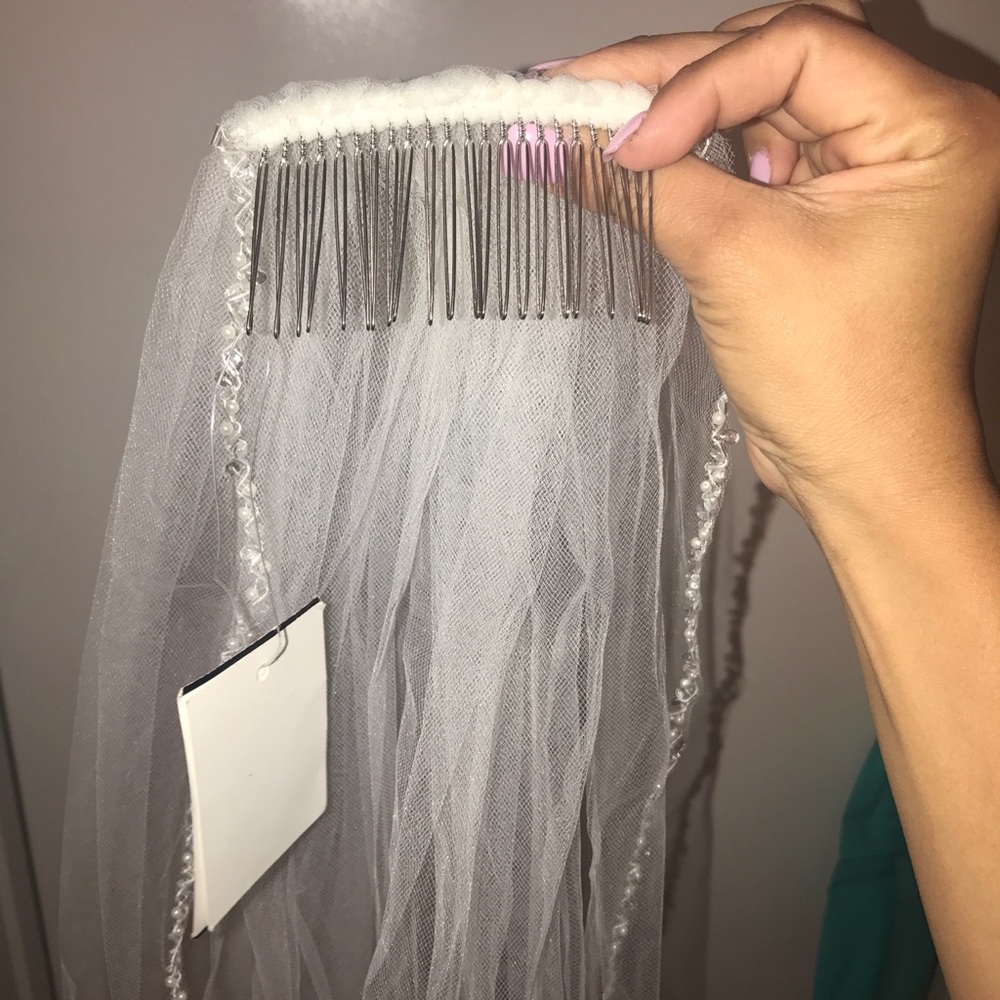 Wedding band and wedding veil