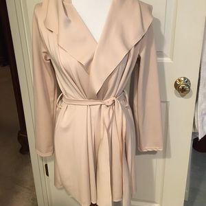 Wrap tie blouse or can be used as a light jacket.