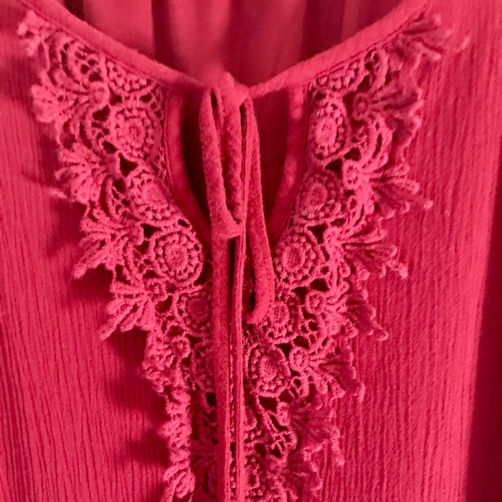Large naïf dress with lace detail.