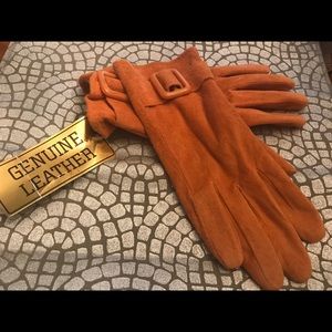 Pumpkin colored genuine suede leather gloves.