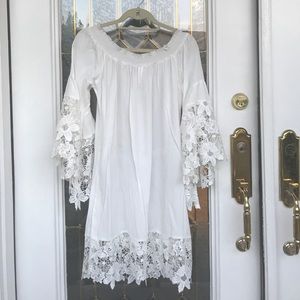 White dress with crochet belle sleeves