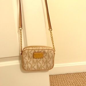 A lightly used MK cross body bag.