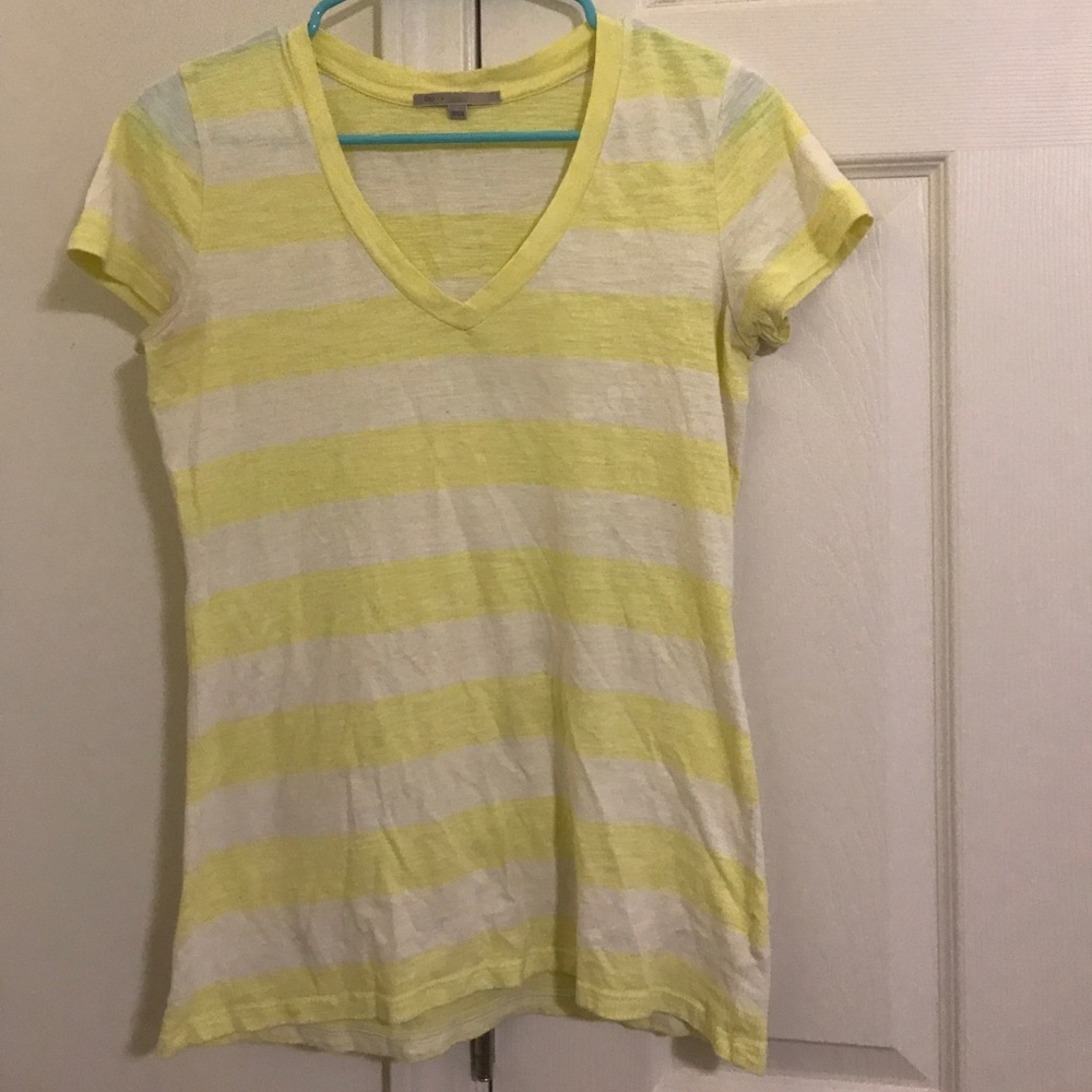 A Gap t-shirt that is yellow and white stripes.