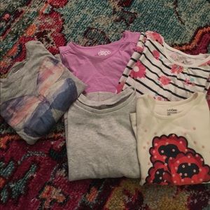 Five long sleeved shirts