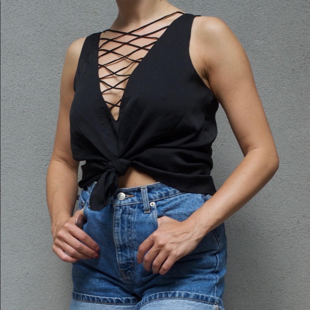 Black criss cross sleeveless blouse