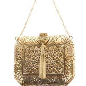 From St Xavier Louis Clutch NWOT