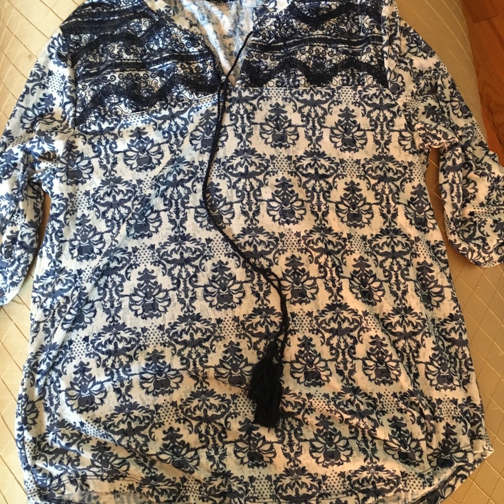 Blue and white print top. Size medium.