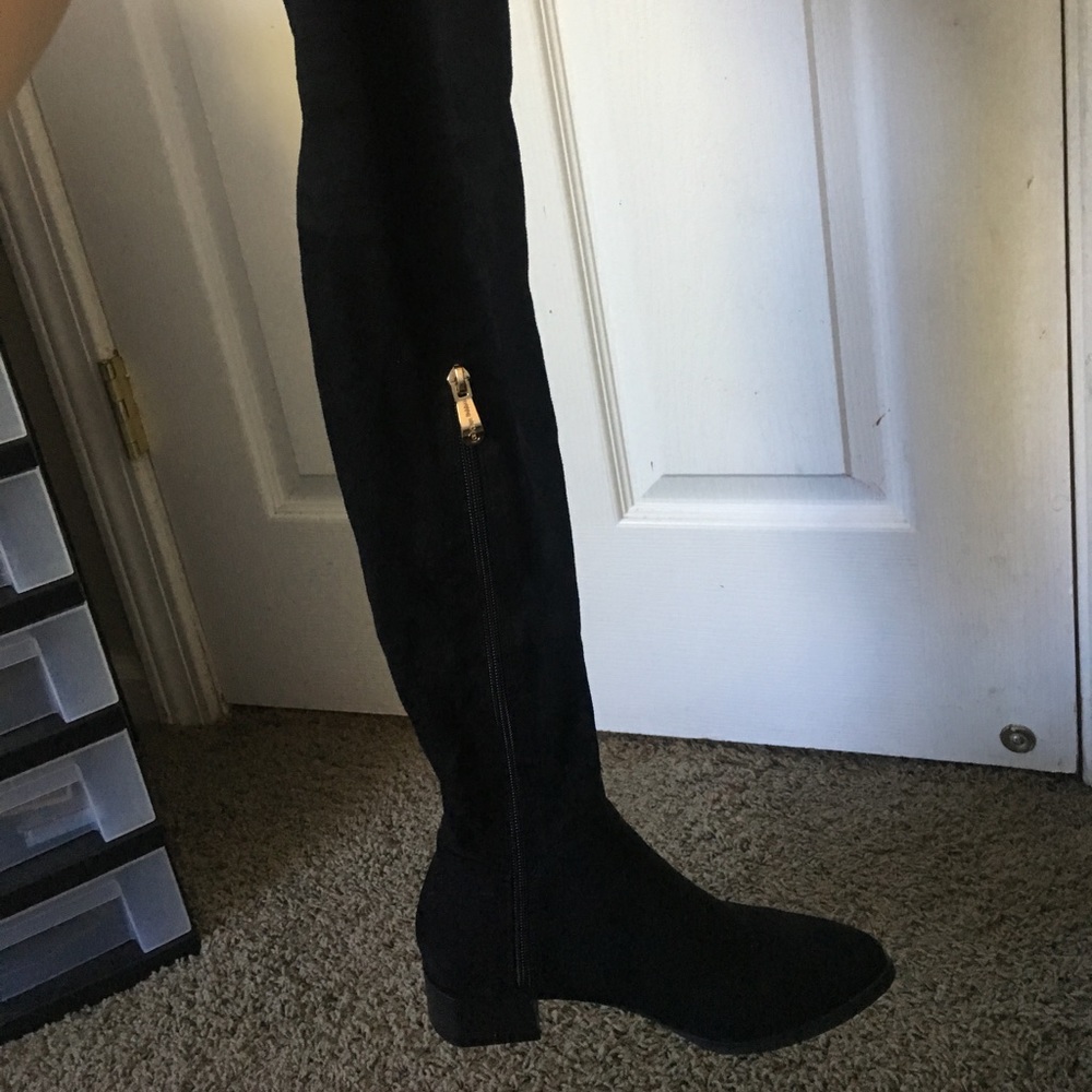 Thigh high black boots
