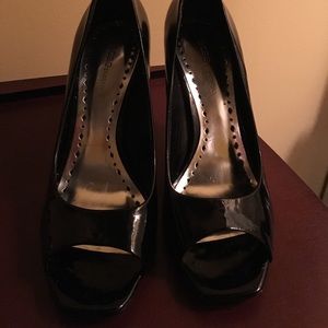 Black peep toe pumps