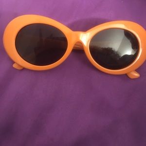 Orange retro round sunglasses