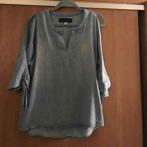 Adorable peep shoulder denim top....Never worn