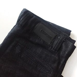 COMUNE black denim jeans.