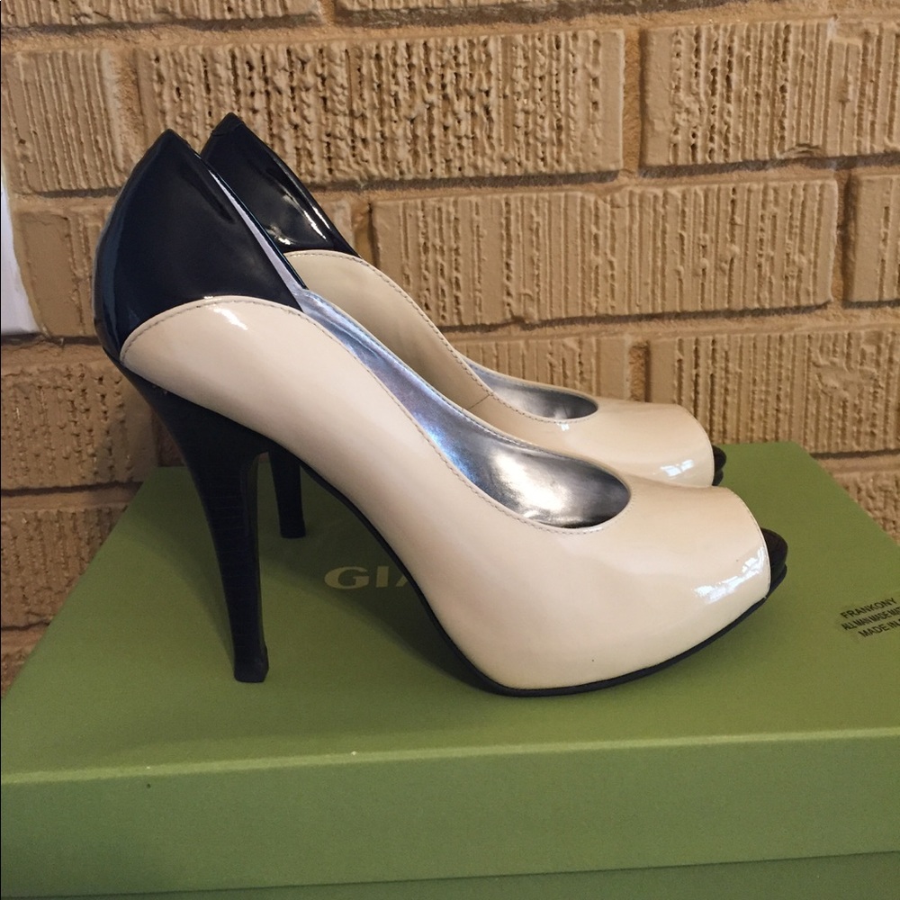 Cream and black pump