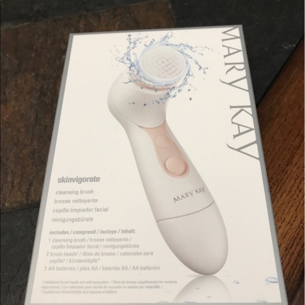 Mary Kay battery powered facial cleansing brush.