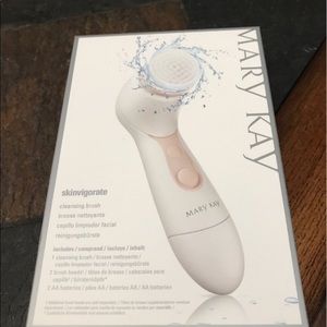 Mary Kay battery powered facial cleansing brush.