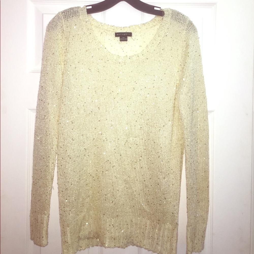 Sparkly gold cable knit sweater.