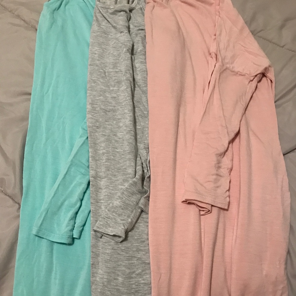 3 brand new tunics w/ pockets!!