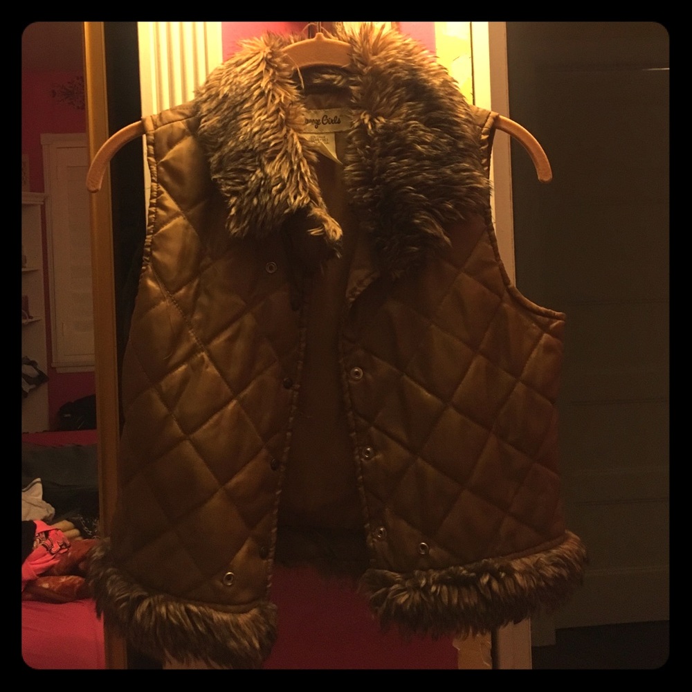 A stylish sleeveless faux fur vest