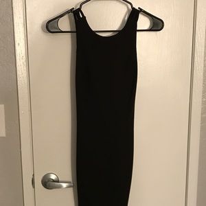 Small black strapped back body con mini