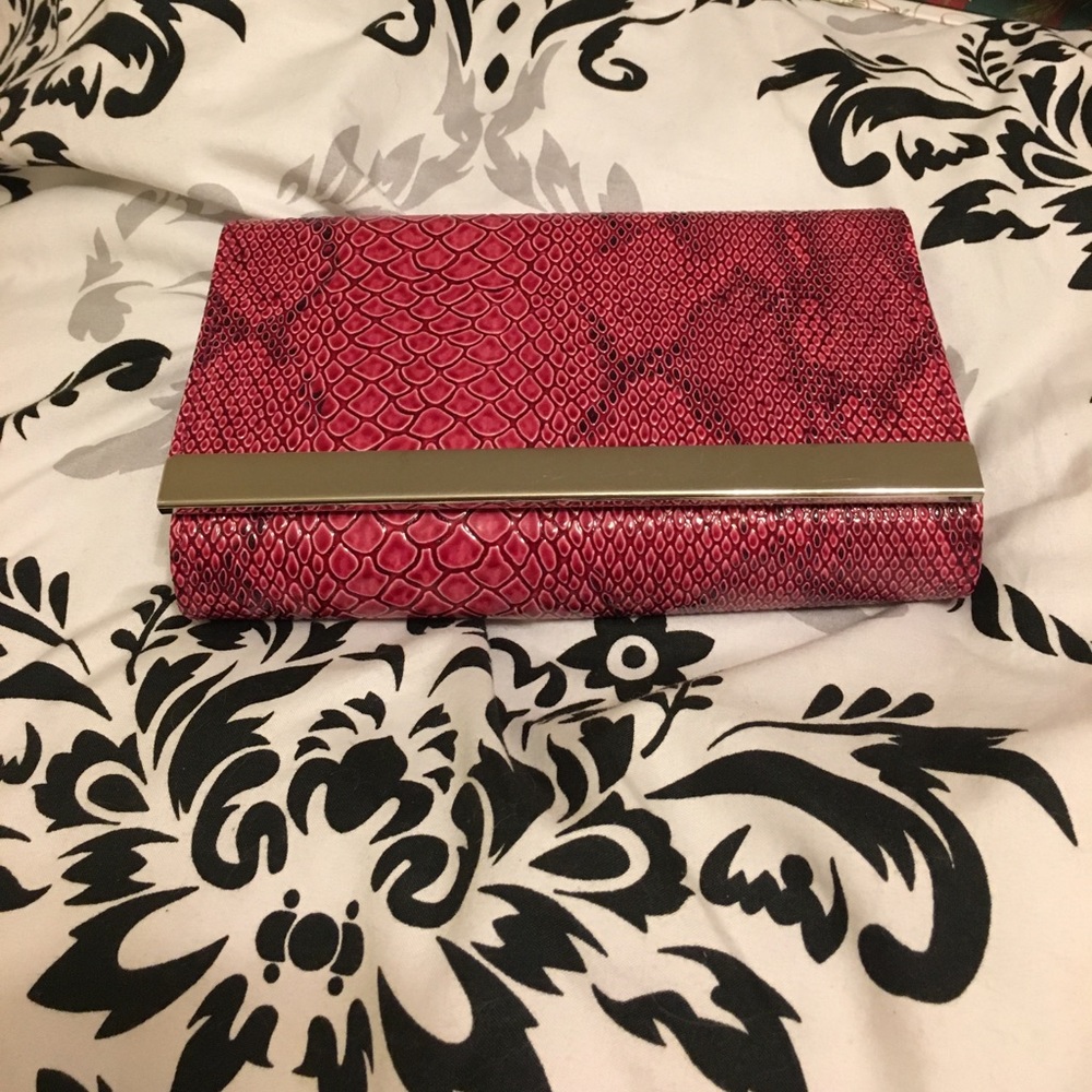 NWOT Pink leather clutch purse with gold trim