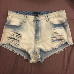 Light wash distressed denim shorts
