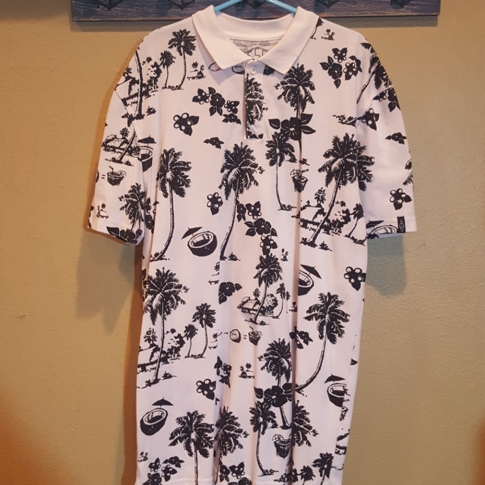 Button up polo shirt. Hawaiian pattern.