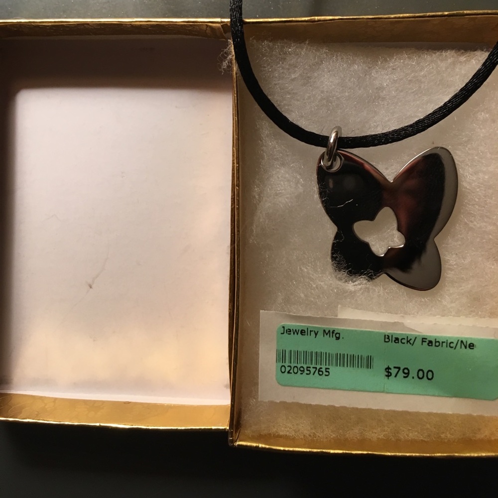 Butterfly pendant retail at $79 new!