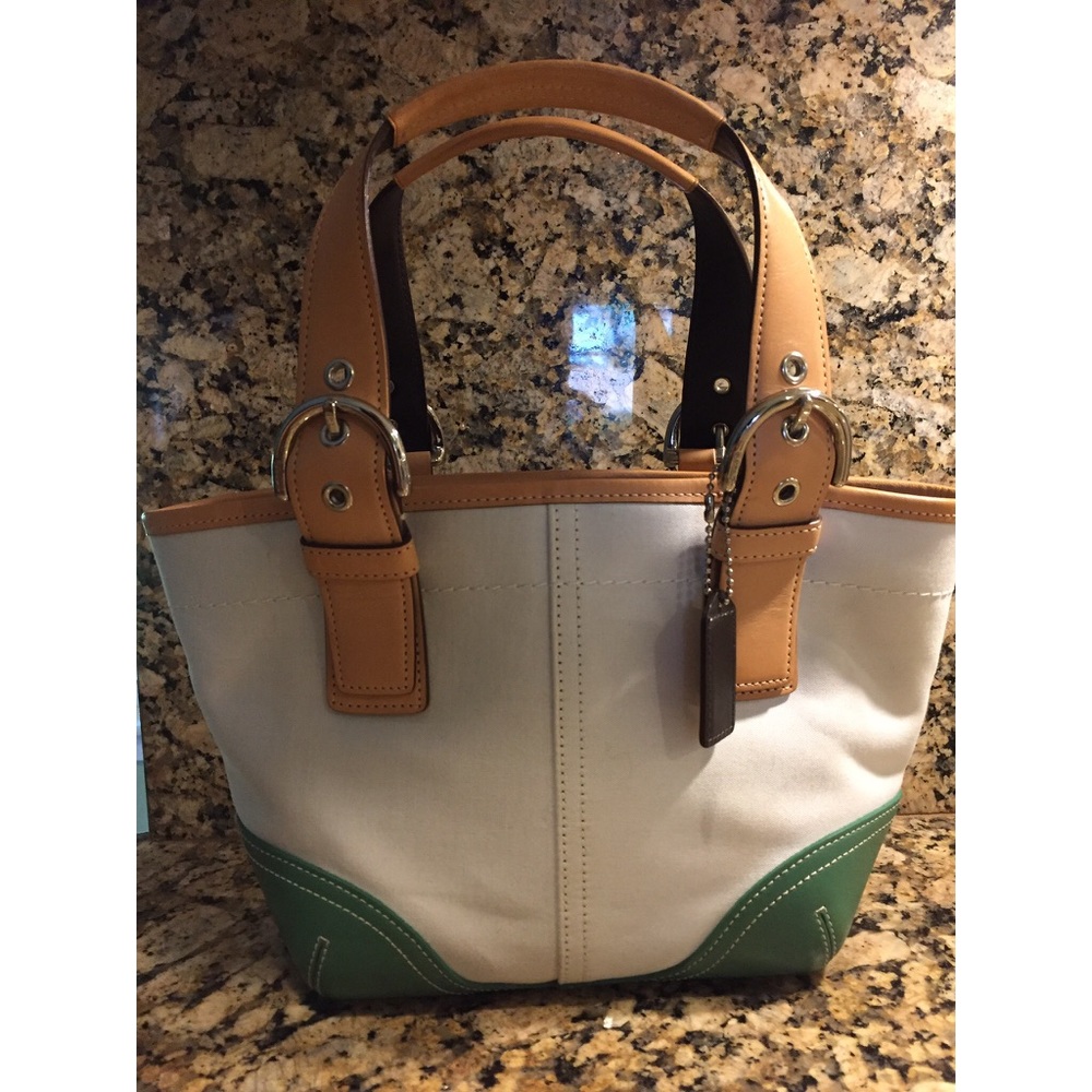White and green Coach purse