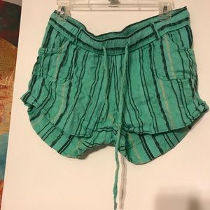 Green striped linen shorts
