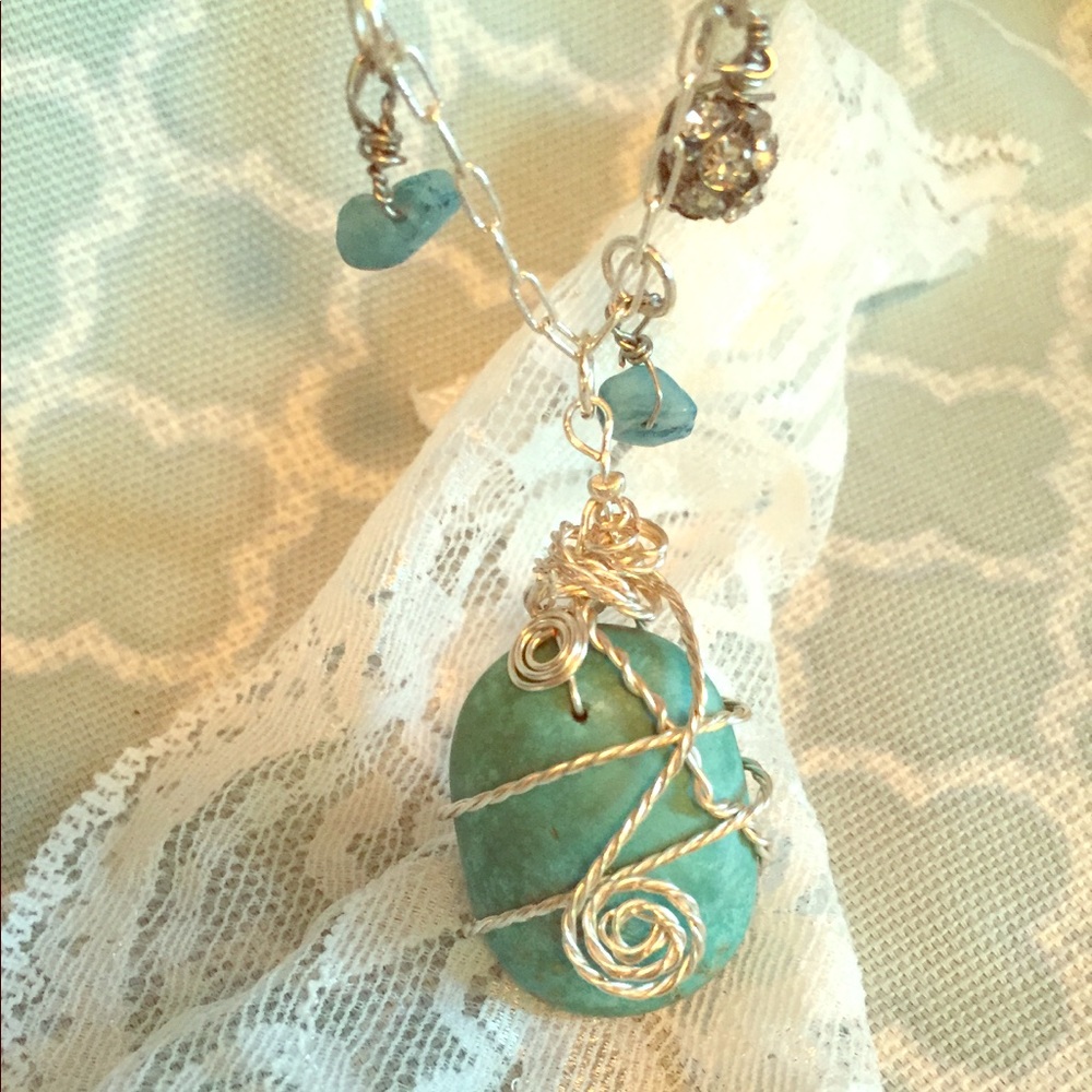 Handmade genuine turquoise and silver pendant