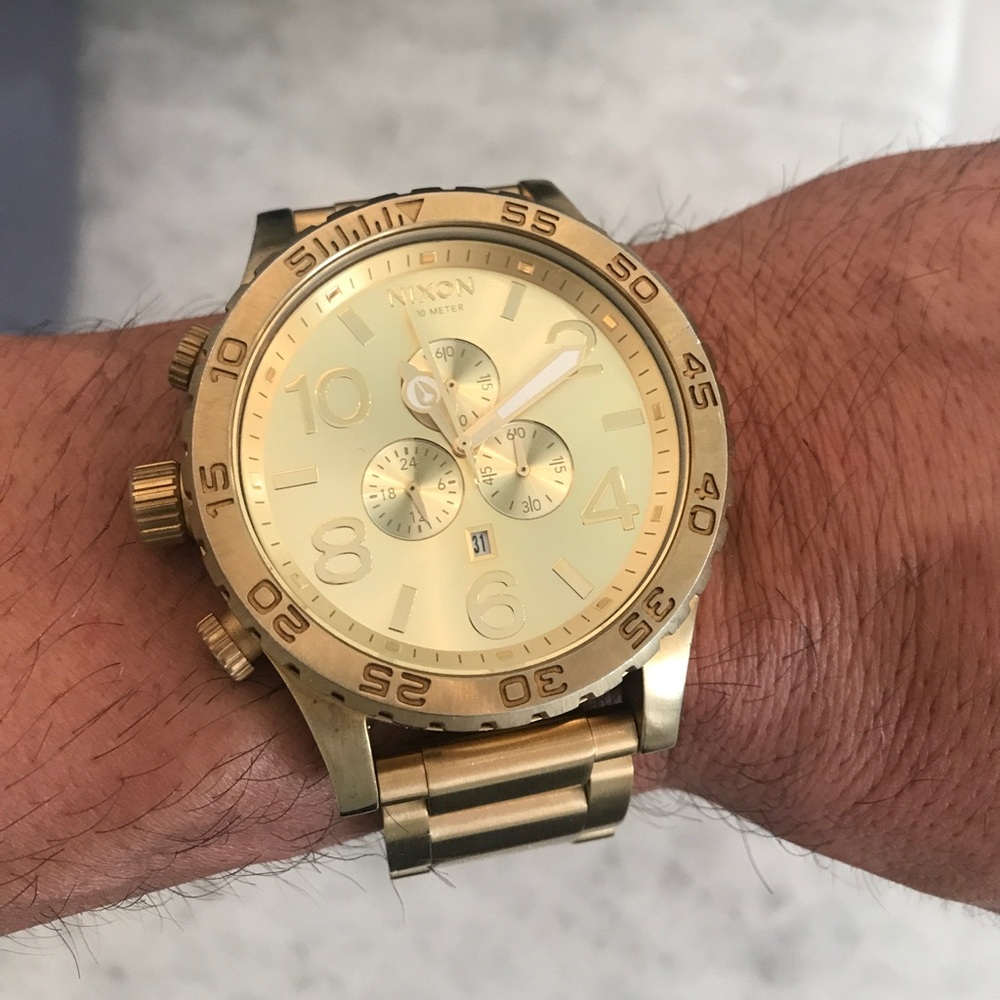 Nixon gold watch